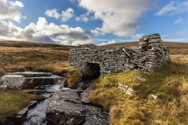 Old stone mill on a stream