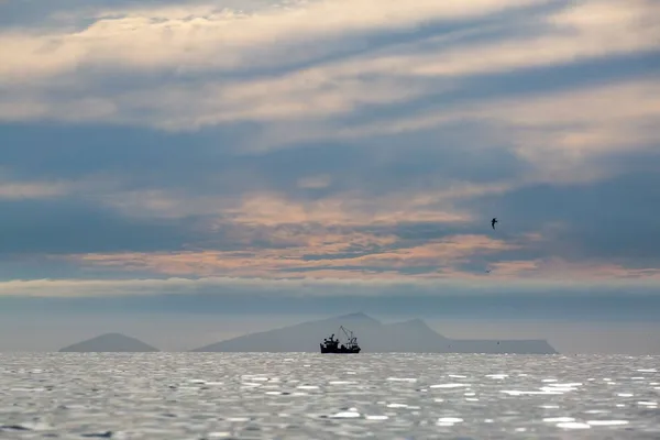 Small boat at sea