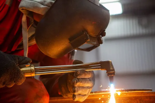 Gas cutting at the boat building shed