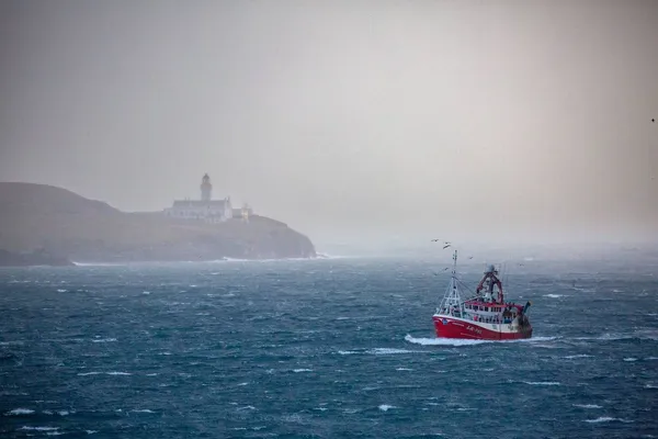 Fishing boat arriving in Lerwick harbour