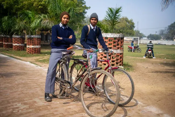 Cyclists at the cricket pitch